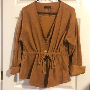Tan corduroy top from Nasty Gal.